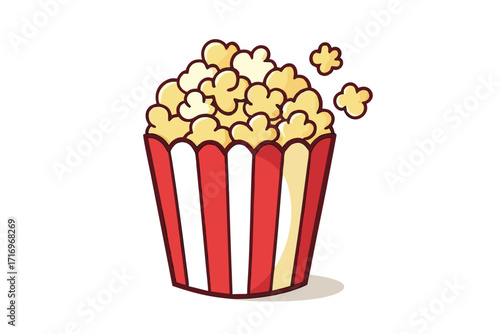 Popcorn in a striped bucket ready for movie night or snack time joy 
