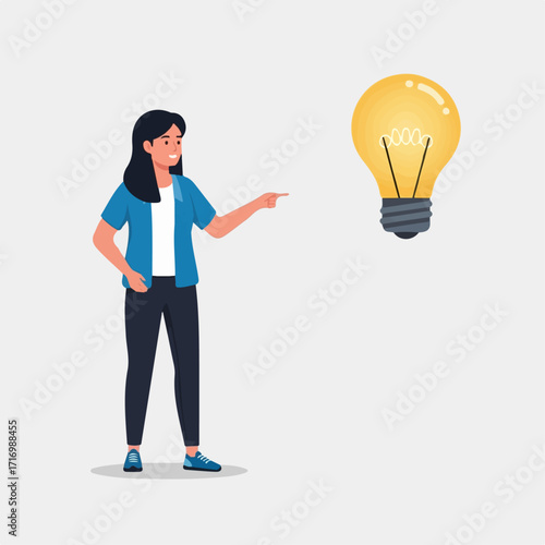 Woman Pointing at a Glowing Yellow Light Bulb Idea Concept.