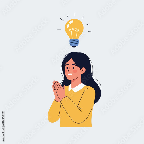 Smiling Woman with Idea Bulb Above Hands Clasped Yellow Sweater.
