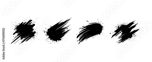Abstract black ink splatters and brush strokes on white background.