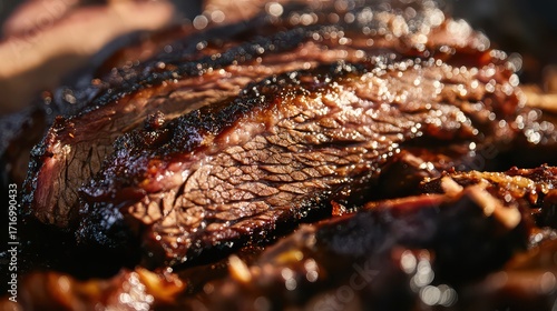 Close up of a slice of smoked beef brisket with a dark crust and juicy meat