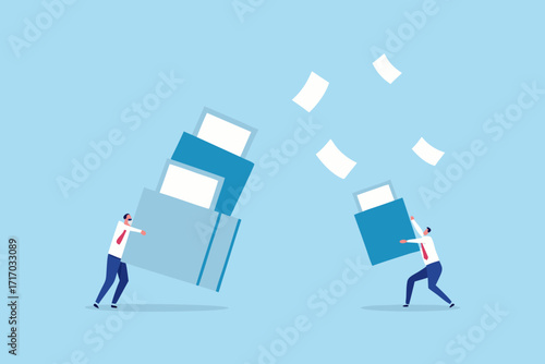 Businessman struggling with heavy stack of files while another man tries to catch falling documents