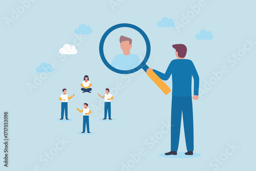 Man with magnifying glass examining a group of diverse people for recruitment or selection