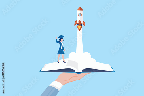 Graduation student launching a rocket from an open book held by a hand symbolizing education and future success