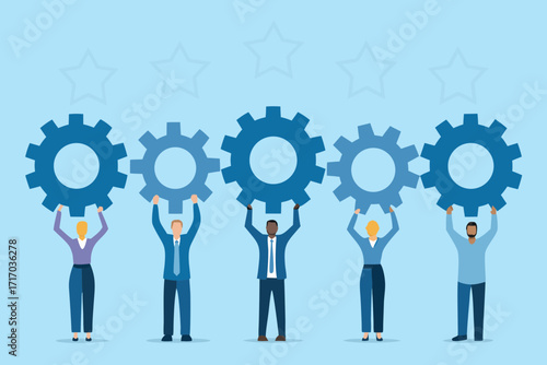 Diverse team of professionals working together holding up gears symbolizing collaboration and teamwork
