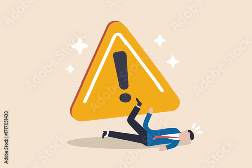 Business man falling down after hitting a large yellow warning sign with exclamation mark