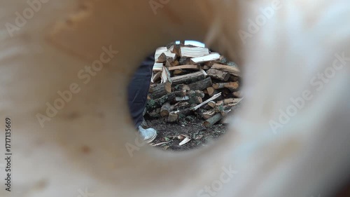 Wallpaper Mural Stockholm, Sweden A man picks up and carries freshly split firewood in the autumn. Torontodigital.ca