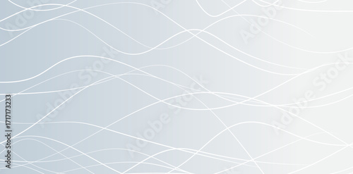 A modern abstract background presents flowing white lines against a gradient from light to medium gray, ideal for contemporary designs and digital compositions