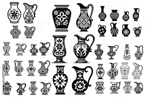 Collection of black and white decorative ceramic vases and pitchers
