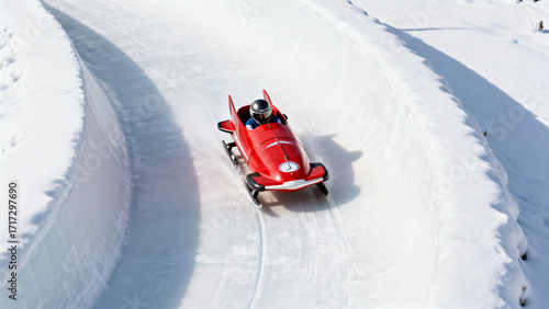 Red bobsled racing down a snowy track in winter sports competition