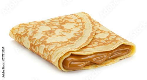 Dulce de leche stuffed crepe on a white plate isolated on a light background