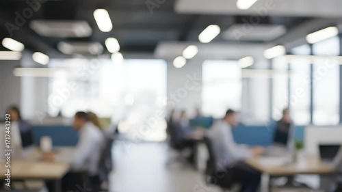 Wallpaper Mural Modern office interior featuring blurred business people working collaboratively showcasing teamwork and corporate success in a bright open-plan workspace perfect for showcasing productivity Torontodigital.ca
