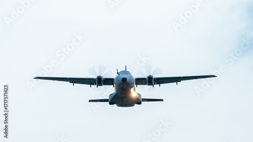 Military cargo plane flying in the sky