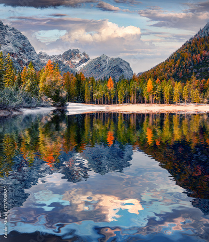 First snow on Braies Lake.