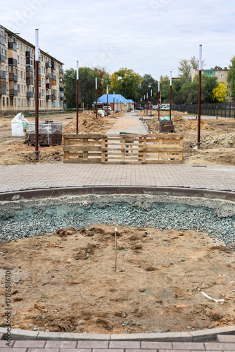 Construction of a New Urban Park Leveling the Ground and Laying New Sidewalks Vibrant Community Space.