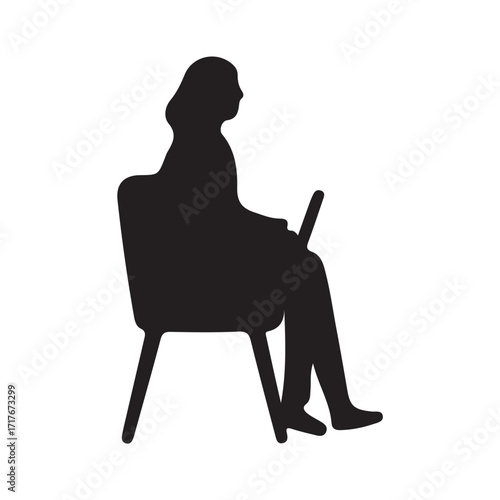 A woman is operating a laptop
