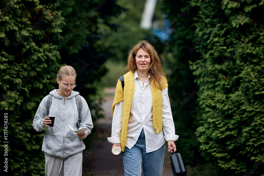 Fototapeta premium young couple walking in park