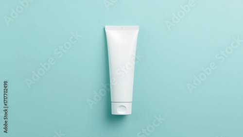 Sleek white tube ready for your branding, perfect for skincare, lotion, or toothpaste mockups on calming turquoise background, a versatile choice for beauty and health product promotions