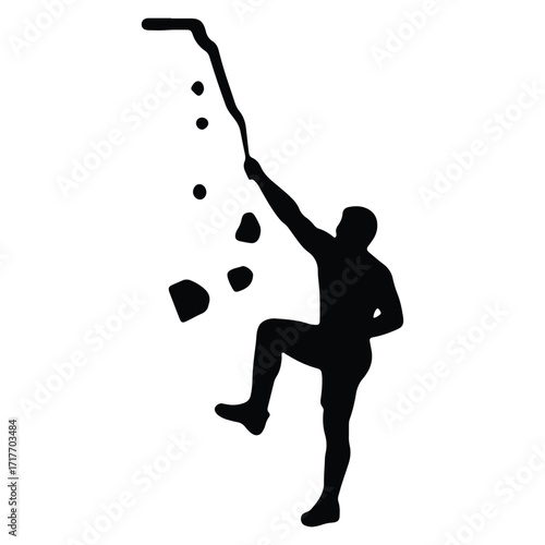 Silhouette of a Climber on a Rock Wall Reaching the Top