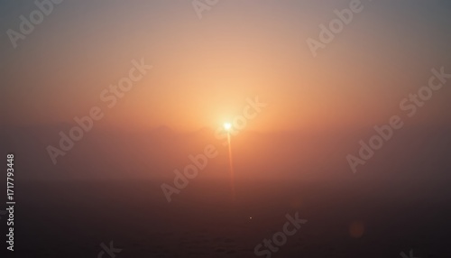 Sunrise over foggy landscape nature scene early morning tranquil atmosphere wide angle view