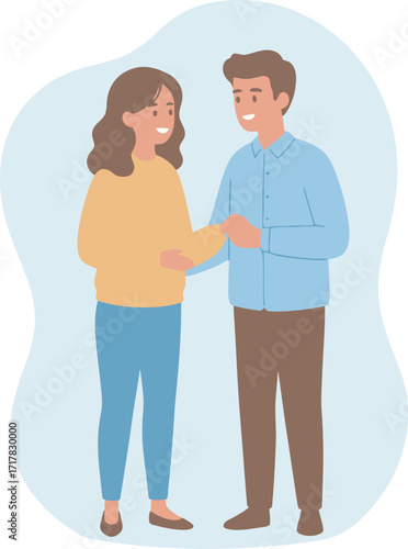 Happy expectant parents gently hold each other's hands, sharing a joyful moment of anticipation.
