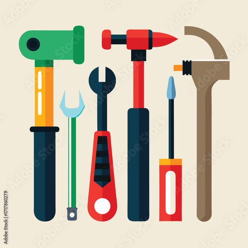 Collection of colorful hand tools including hammers and wrenches