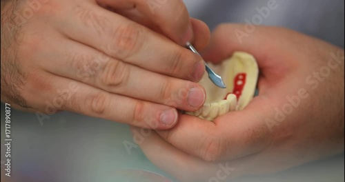Dental prosthesis, dentures, prosthetics work. A study and a table with dental tools