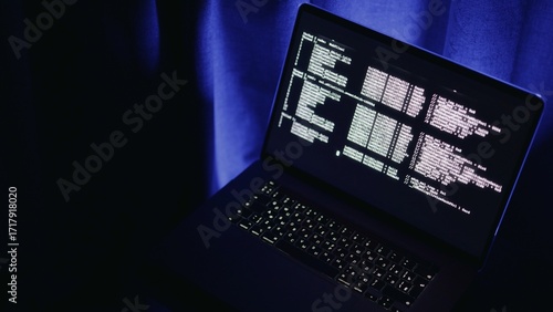 Gamer exploring virtual reality coding interface, gamer interacting with matrix visuals on screen with neon lighting, gamer immersed in green glow, perfect for futuristic gaming content visuals.