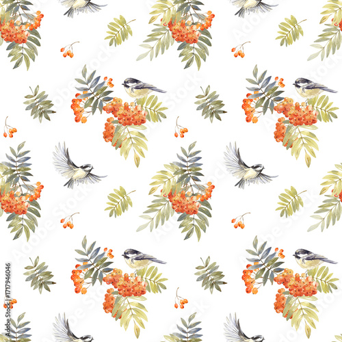 An autumn seamless watercolor pattern with branches, berries, rowan leaves, and titmice. Hand drawn in watercolor. Suitable for textile, fabric, and gift wrapping design.