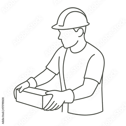 Construction worker wearing gloves lifting a brick block  