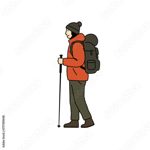 Hiker walking with trekking pole and backpack in winter attire  
