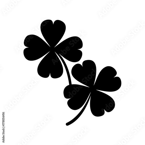 Two Lucky Four Leaf Clovers in Silhouette for Saint Patrick's Day