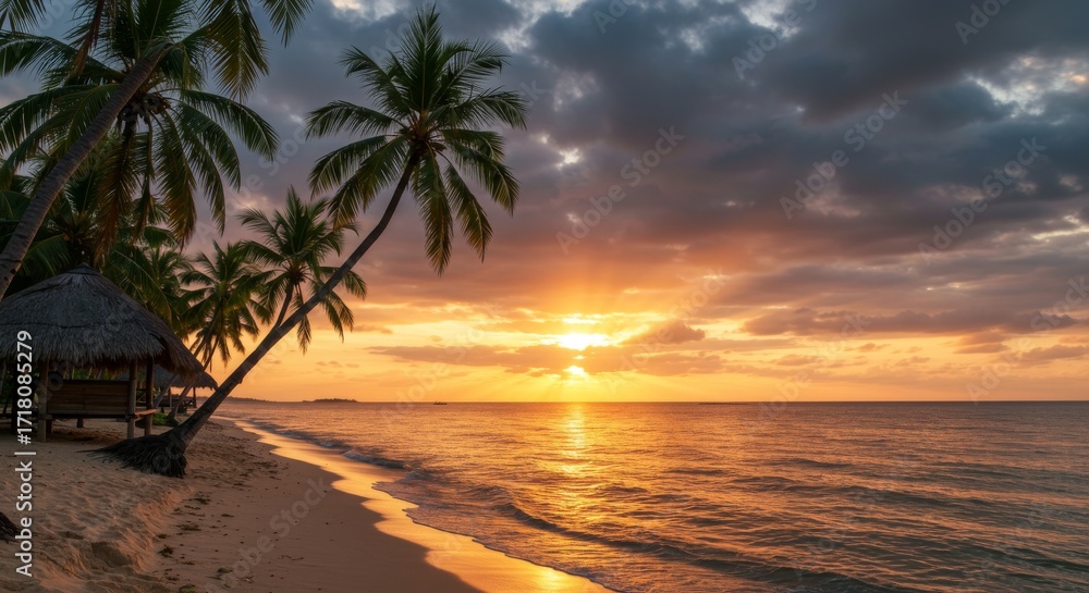 Fototapeta premium Tropical Sunset on a Serene Palm Beach with Golden Glow and Rustic Huts