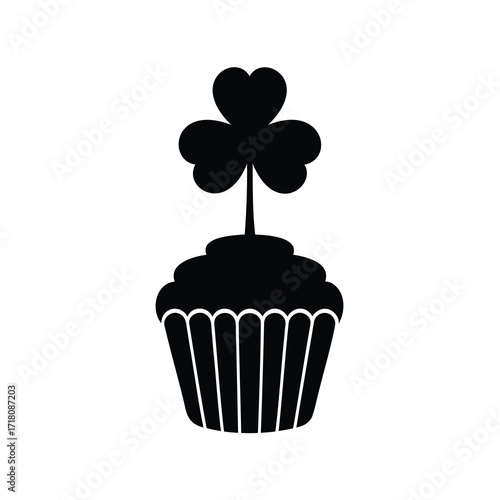 St. Patrick's Day festive cupcake topped with a lucky shamrock illustration