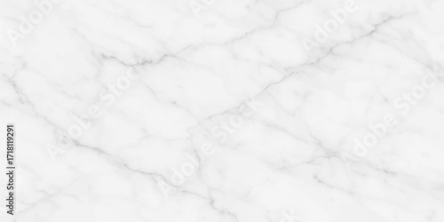 A crisp, textured surface of white snow and ice creates a wintry abstract pattern