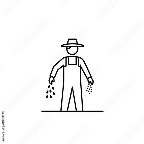 Farmer sowing seeds in a field wearing overalls and a hat.