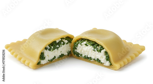 Two halves of a ravioli pasta filled with white cheese and green spinach