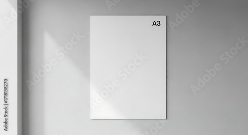 Blank A3 Paper Mock up on Light Grey Wall with Natural Shadows