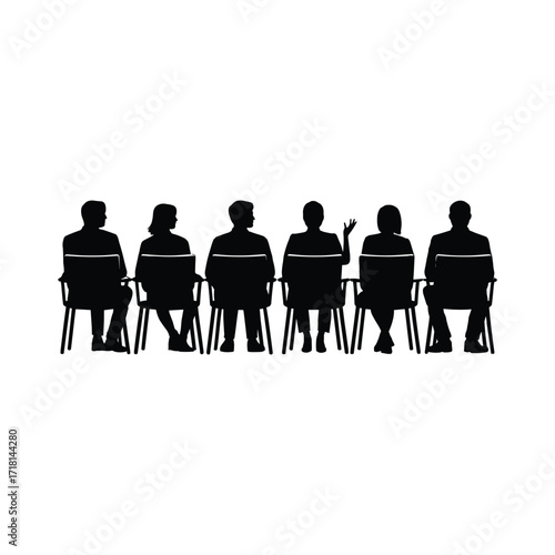 Diverse group of silhouetted people seated in chairs facing forward together