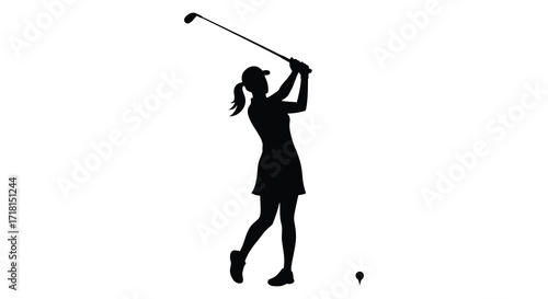 Silhouette of a woman golfer taking a swing on the course