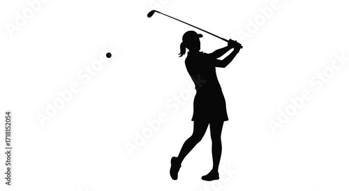 Silhouette of a female golfer swinging a club at a golf ball