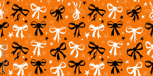 Seamless halloween pattern with black and white bows and stars on an orange background