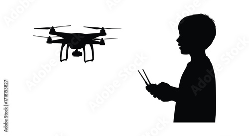 Silhouette of a boy operating a drone with a remote control