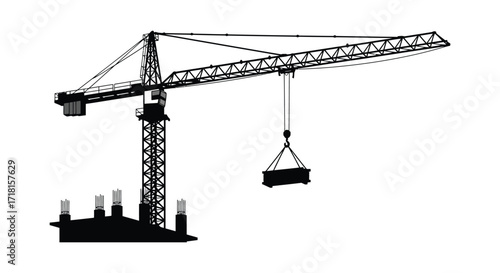 A black and white silhouette of a construction crane with a load