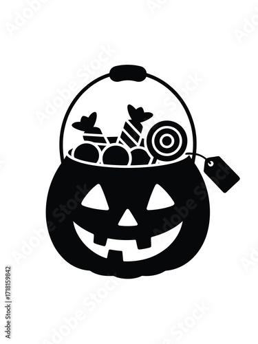 Black silhouette of a jack o lantern candy bucket filled with treats