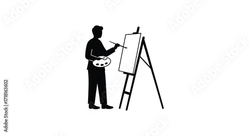 Silhouette of an artist painting on a canvas with an easel