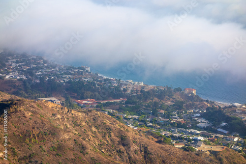 Marine layer rolling in over the Pacific Coast and Getty Villa, taken from Parker Mesa Overlook .