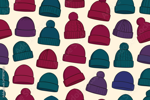 Seamless pattern of colorful winter beanies with pom-poms and cuffs on light background
