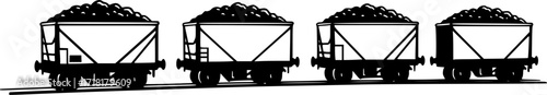 Four carts with coal on railways
