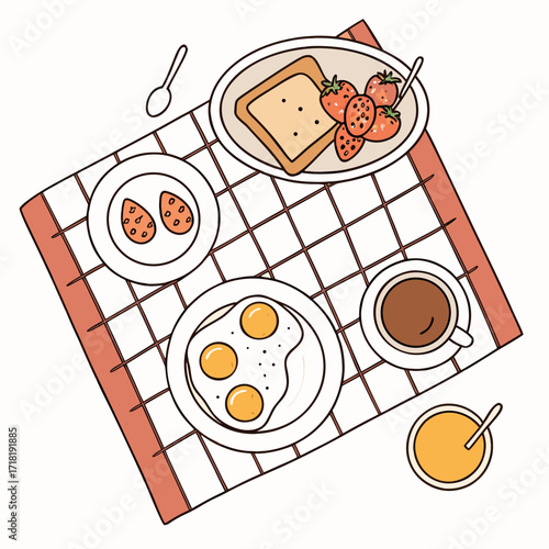 Breakfast table with eggs, toast, strawberries